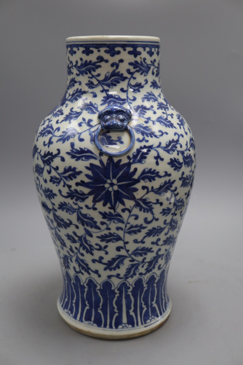 A Chinese blue and white vase, height 39cm (damaged)